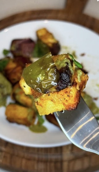 Air-fried pineapple paneer tikka skewer with charred paneer, fresh pineapple, and bell peppers