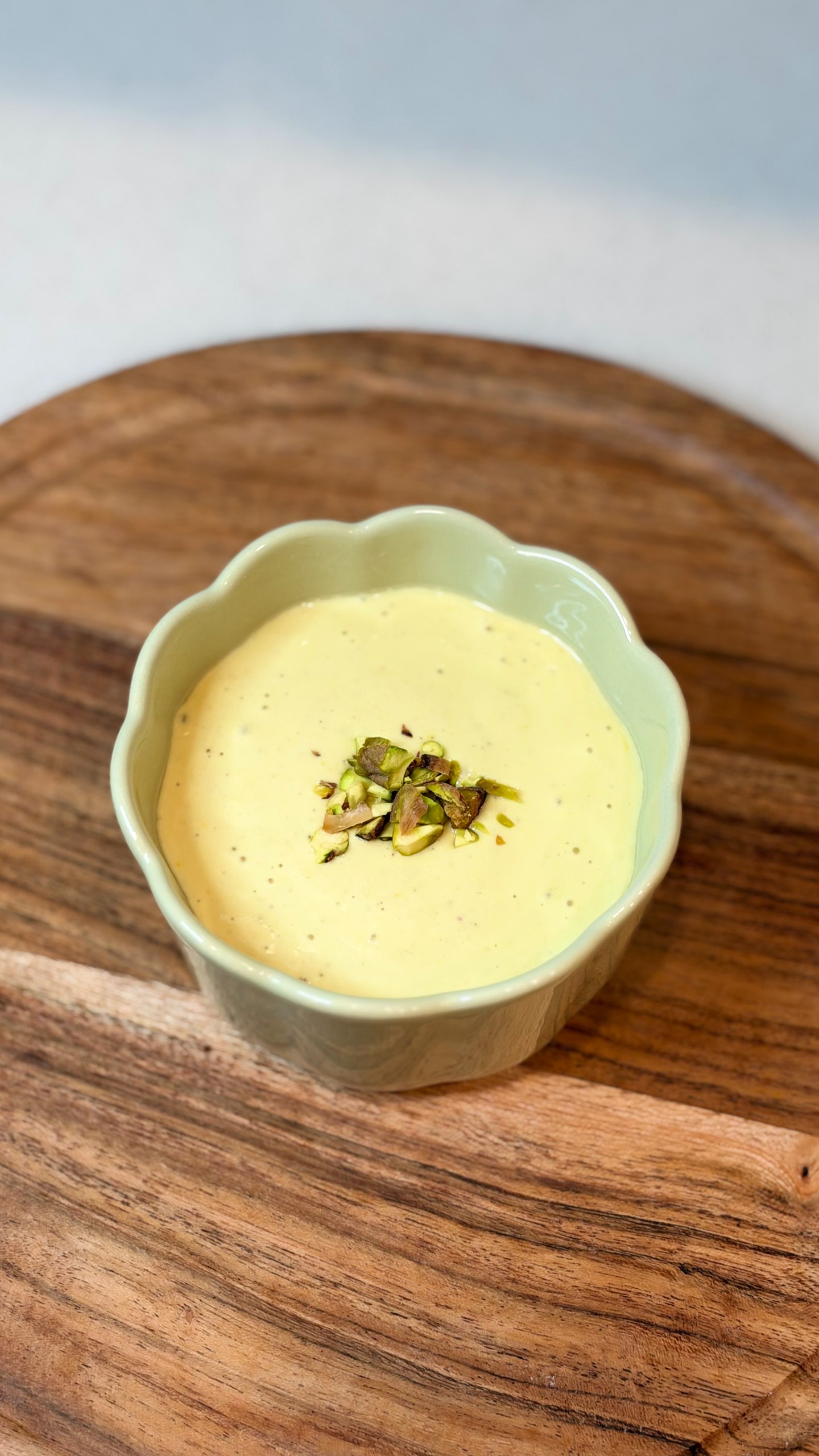 Kesar pista makhana pudding made with Greek yogurt, saffron, pistachios, and roasted makhana